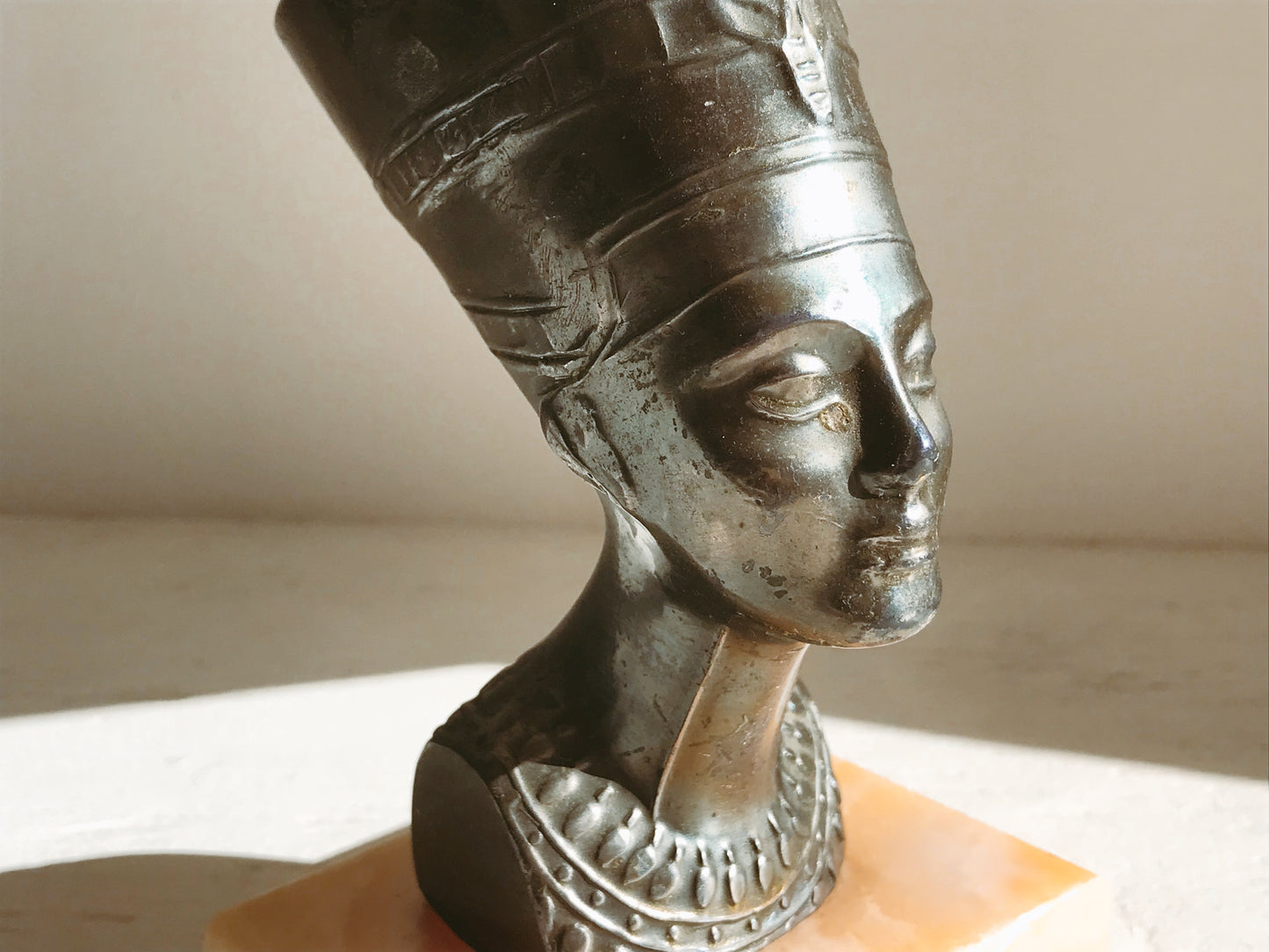 Bronze Bust of Nefertiti on Alabaster